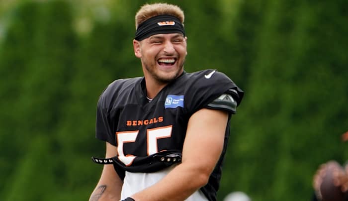 Aug 4, 2022; Cincinnati, OH, USA; Cincinnati Bengals linebacker Logan Wilson (55) talks with teammates before stretch during Cincinnati Bengals training camp practice, Thursday, Aug. 4, 2022, at the Paul Brown Stadium practice fields in Cincinnati. Mandatory Credit: Kareem Elgazzar-USA TODAY Sports